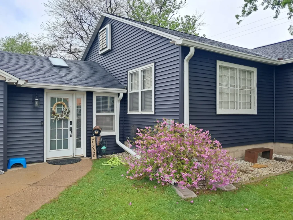 blue siding project-vanguard roofing and siding-stevens point