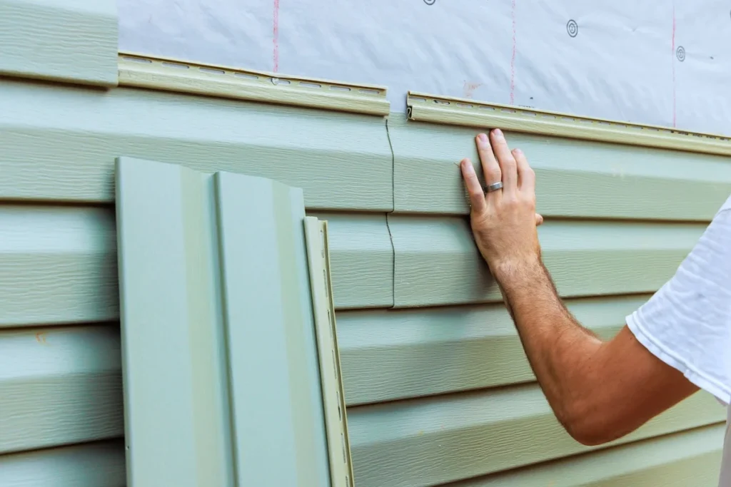 isntalling-mint-green-siding
