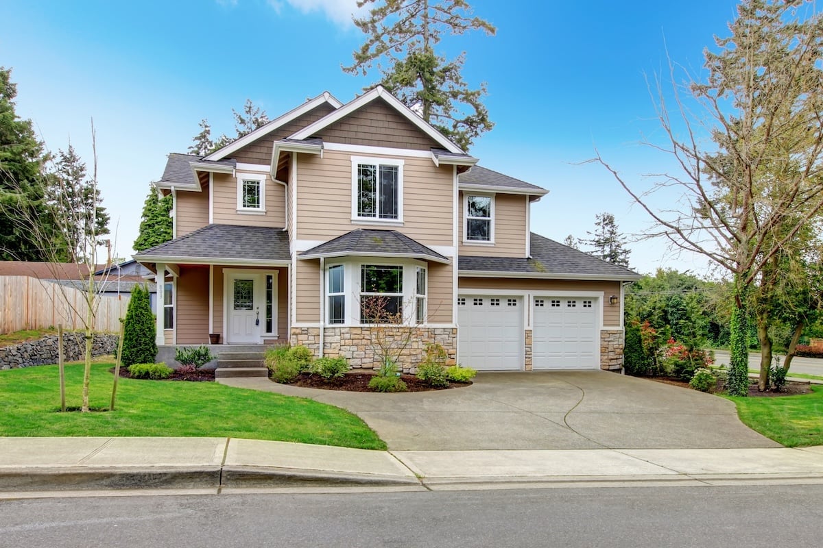 tan-house-with-gray-shingles