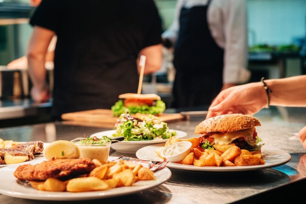 Food orders on the kitchen table in the restaurant