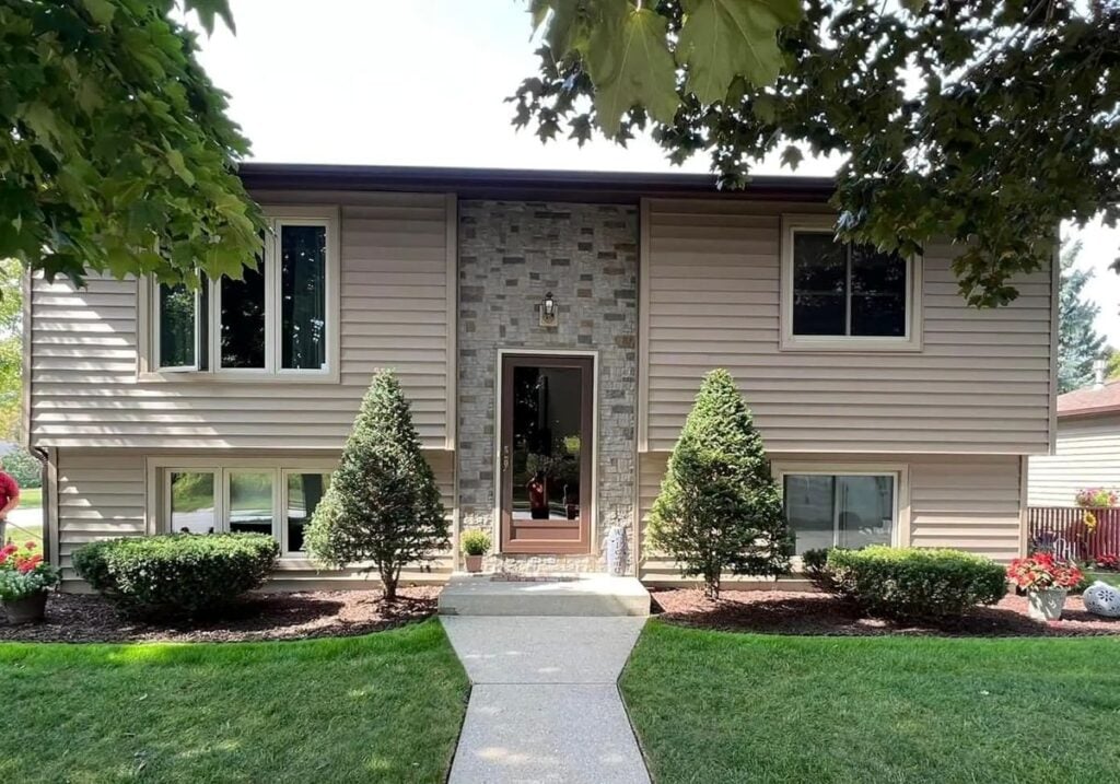 siding rothschild Vanguard Roofing beige siding big front door