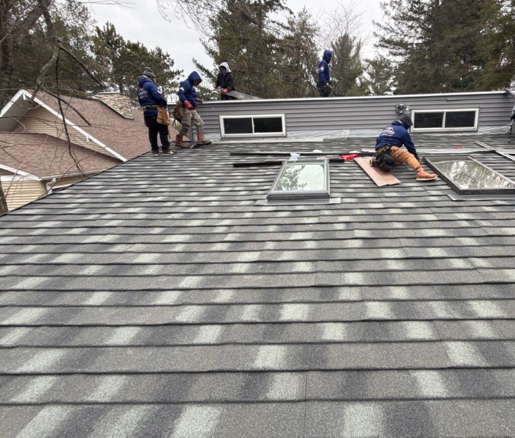 Vanguard team working on a roof
