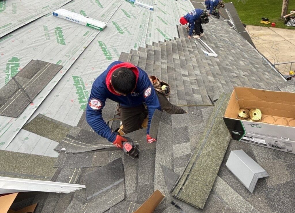 Vanguard team working on repairing a roof