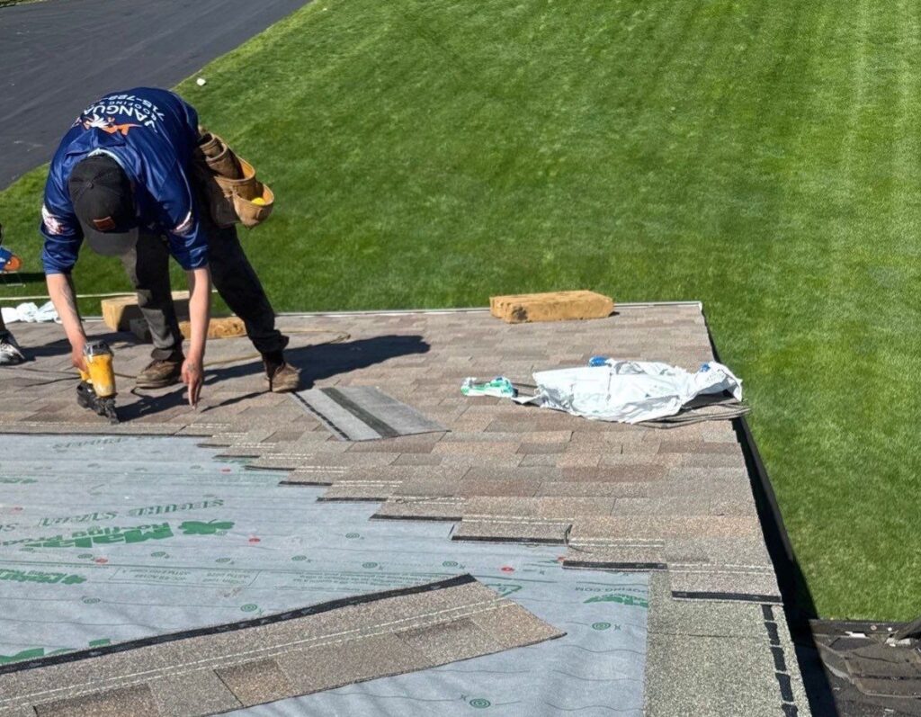 Vanguard team repairing a roof