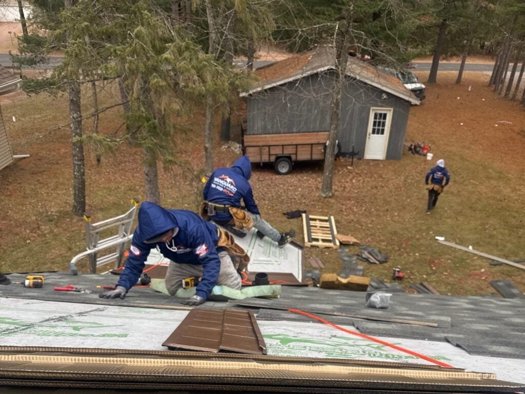 Vanguard Roofing team working on a roof