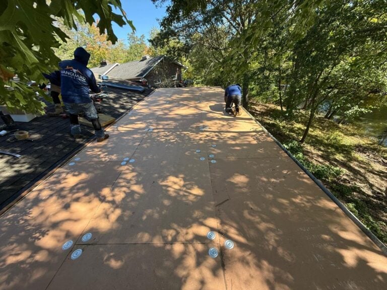 Vanguard team working on replacing a roof