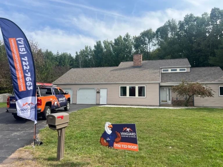 new roof estimate brown light grey shingles branded truck parked outside house