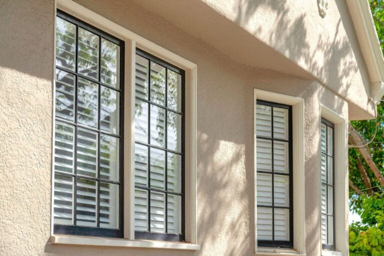 beige house with black and white windows, Types of Windows