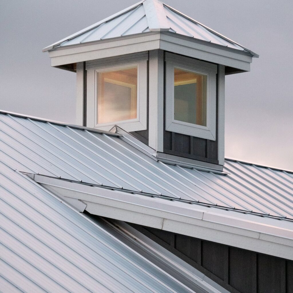 Metal roofing system with rooftop windows for a quality-focused roofing company in Wheaton, IL