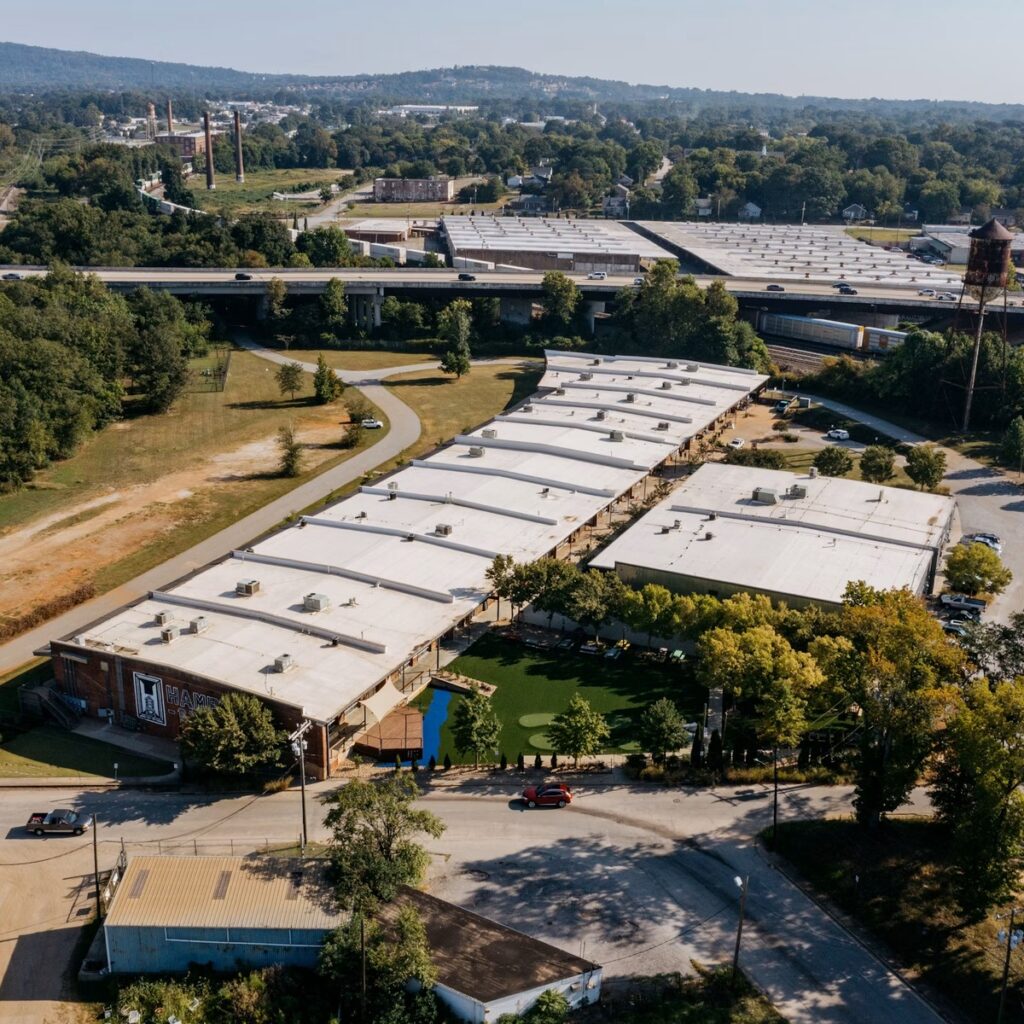 Aerial view of large commercial flat-roof buildings for a reliable roofing company in Lombard, IL