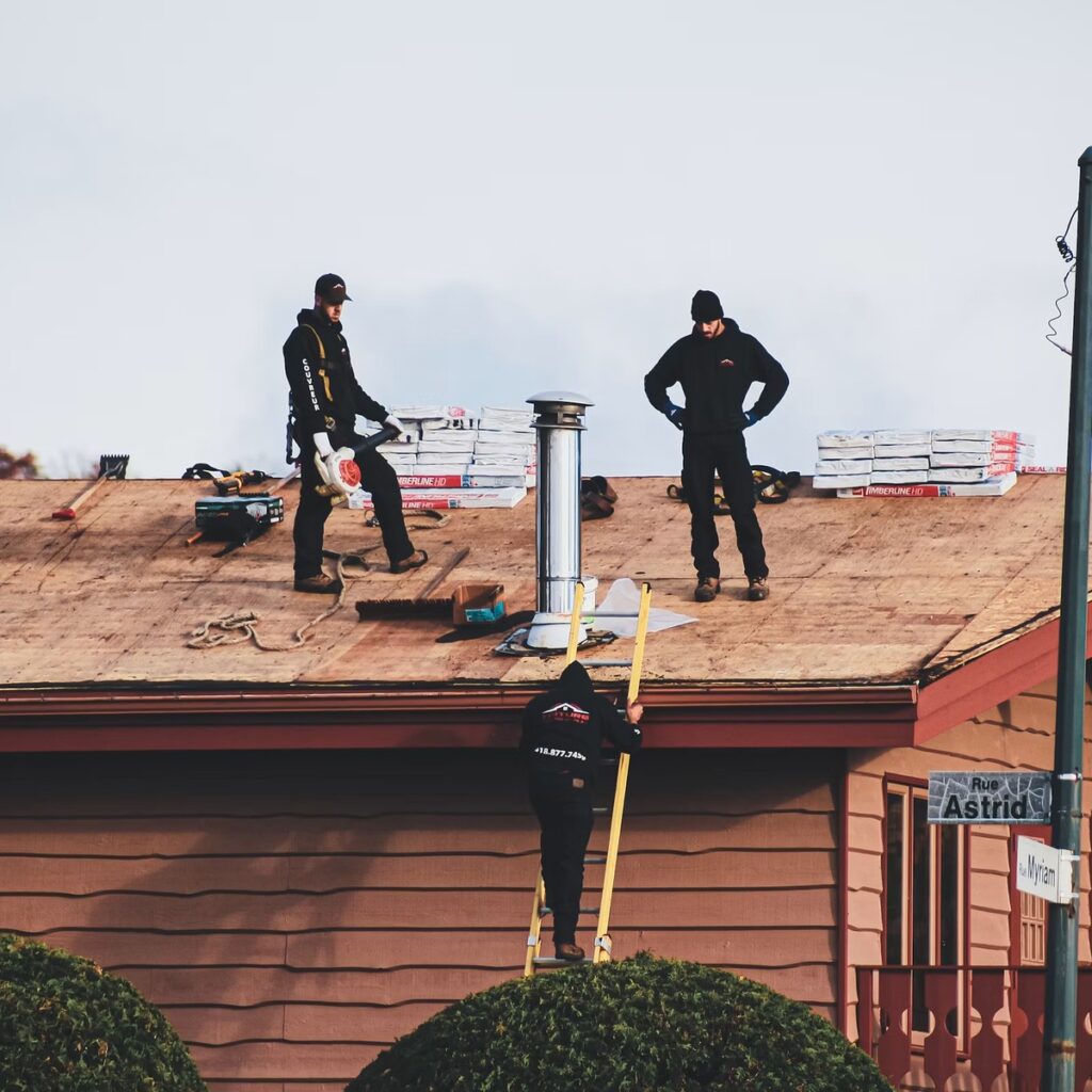 Roofing professionals preparing a residential roof for a professional roofing company in Oak Brook, IL